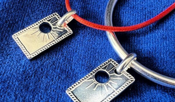 Utilisation et signification du pendentif Soleil en bijouterie