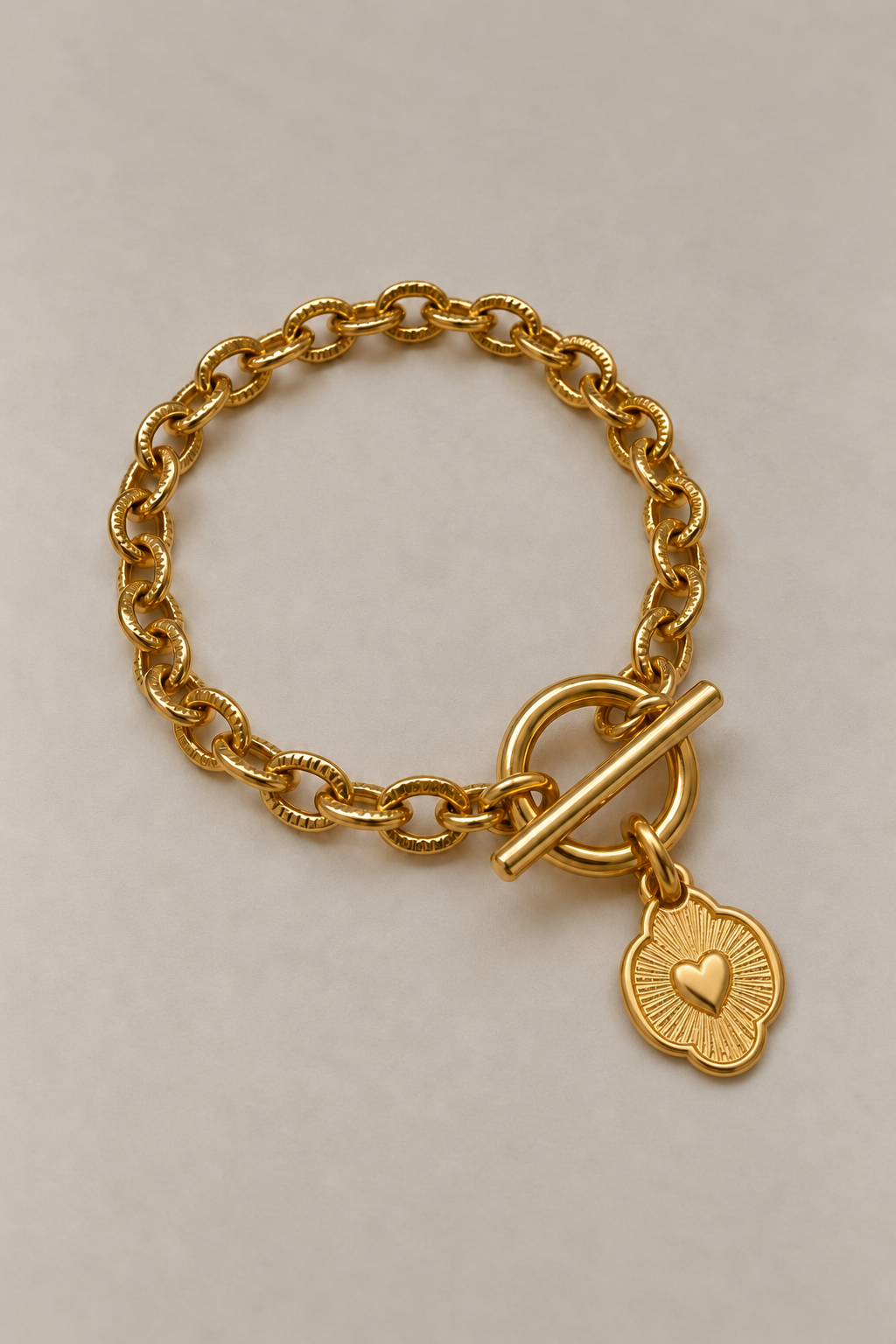 Bracelet Scarlett cœur bohème doré Musardise, chaîne striée et pendentif cœur rayonnant