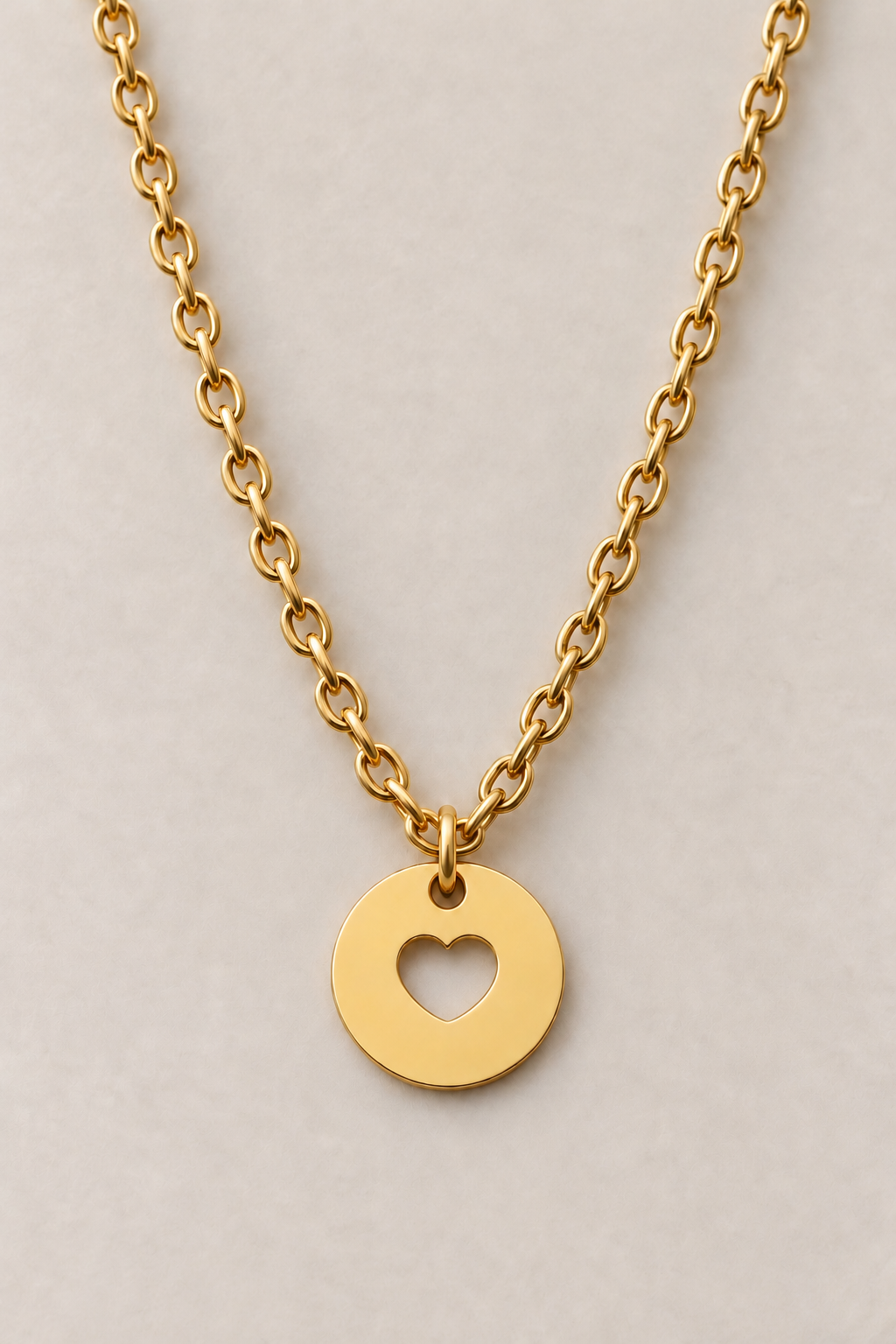 Collier Alma cœur doré Musardise avec médaille ronde au cœur évidé