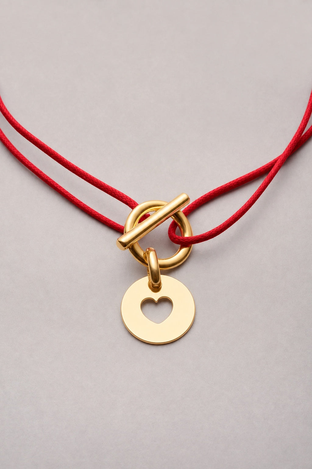 Collier attache cœur doré, cordon rouge
