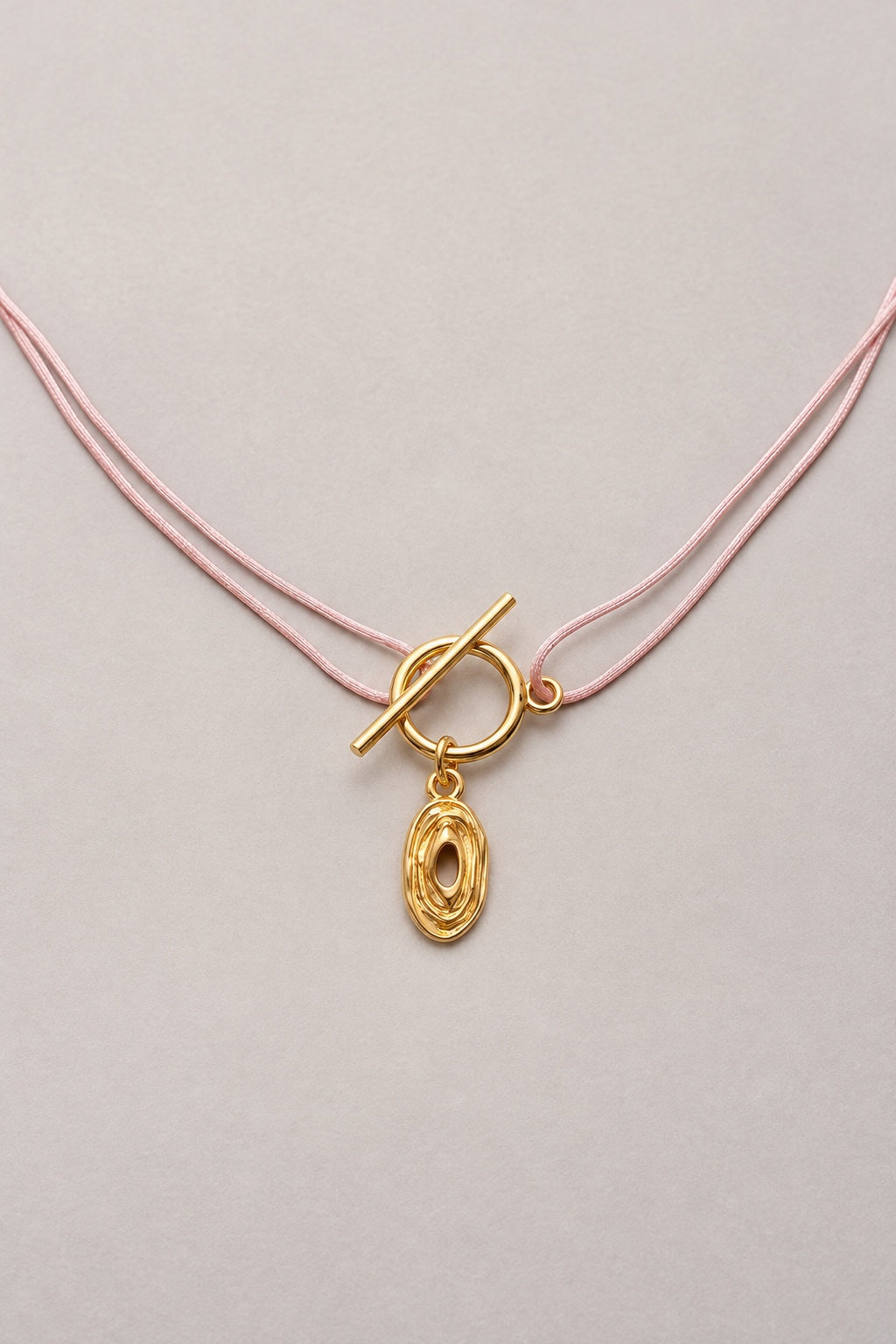 Collier Lou Hazel doré sur cordon rose pâle